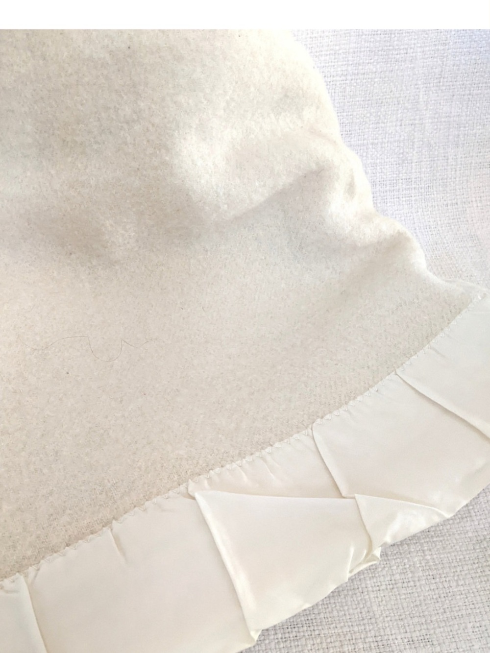 VTG Baby blanket by  Chatum all wool satin trim  in Cream ..